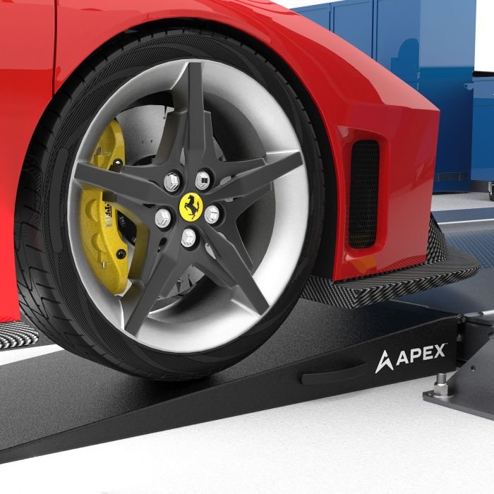 APEX low-profile scissor lift platform with red Ferrari — ideal for exotic and low-clearance vehicles