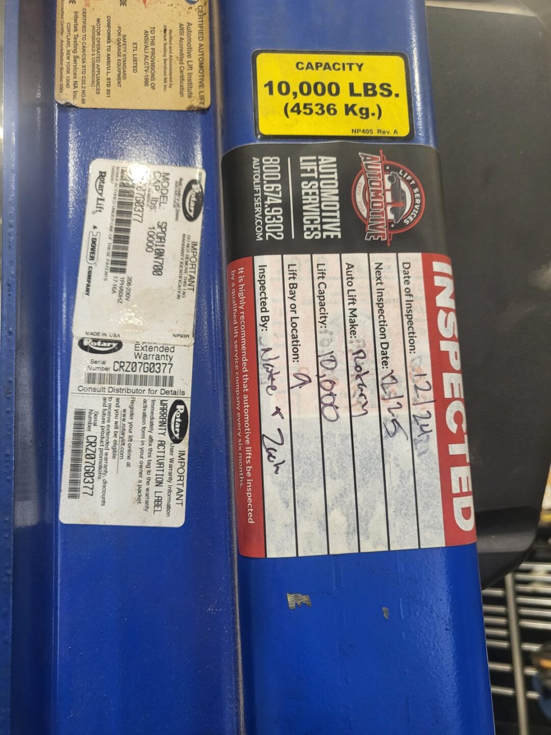 Automotive Lift Services inspection sticker on Rotary SPOA10N700 10000 lb lift, inspected 12/24
