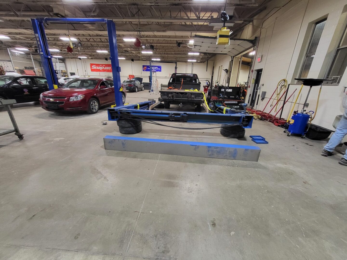 Two-post lift removal and haul-off by Auto Lift Services in Iowa