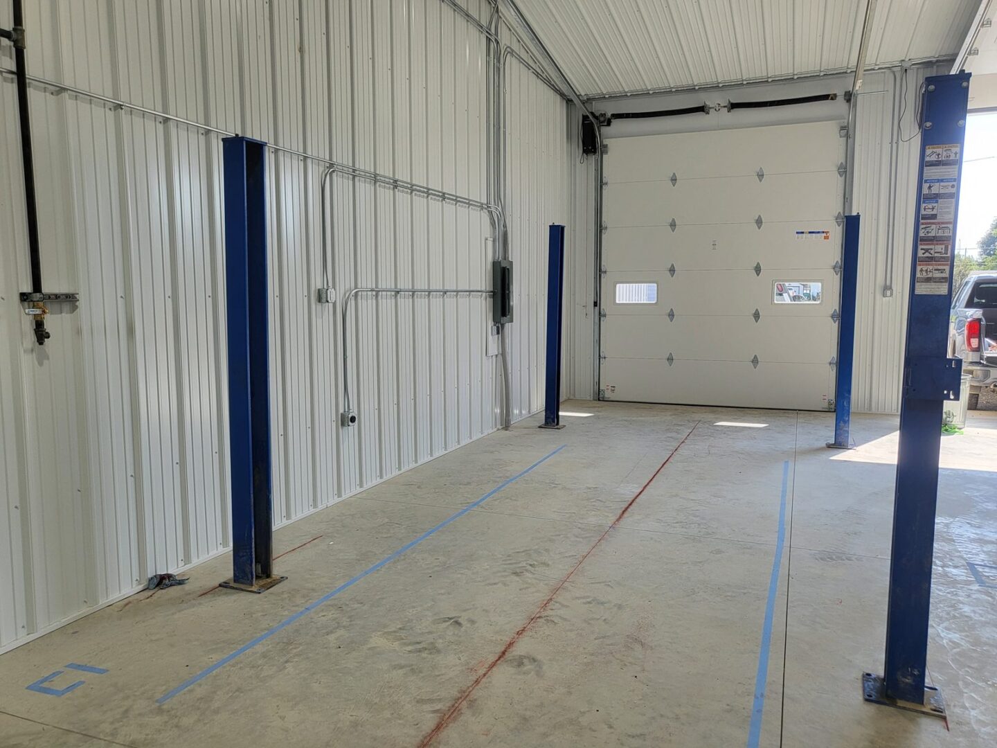 Four-post lift installed by Auto Lift Services