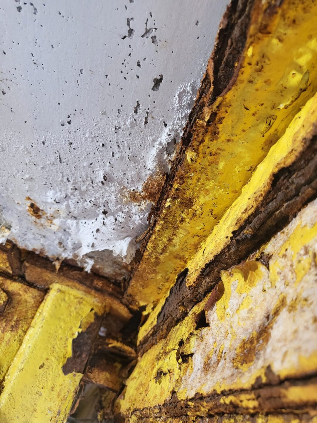 Worn service pit before repair by Auto Lift Services in Iowa