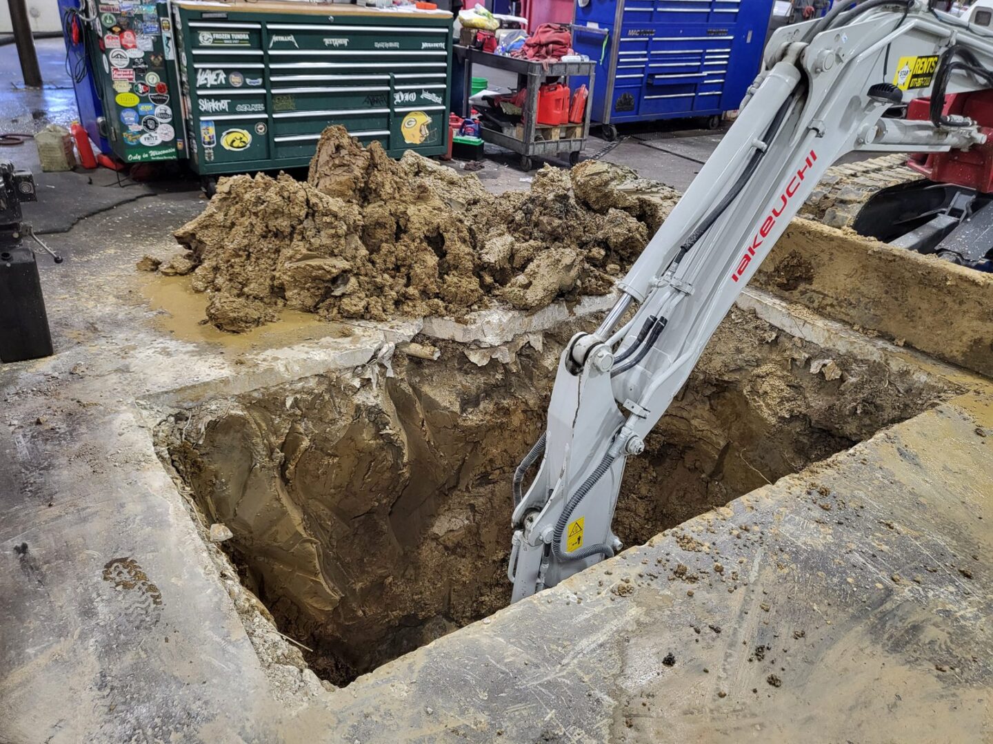 Old inground lift removal by Auto Lift Services in Iowa