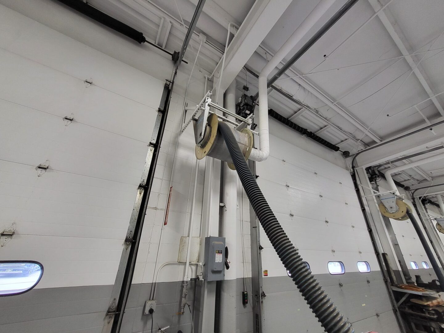 Exhaust ventilation hose reel installed by Auto Lift Services