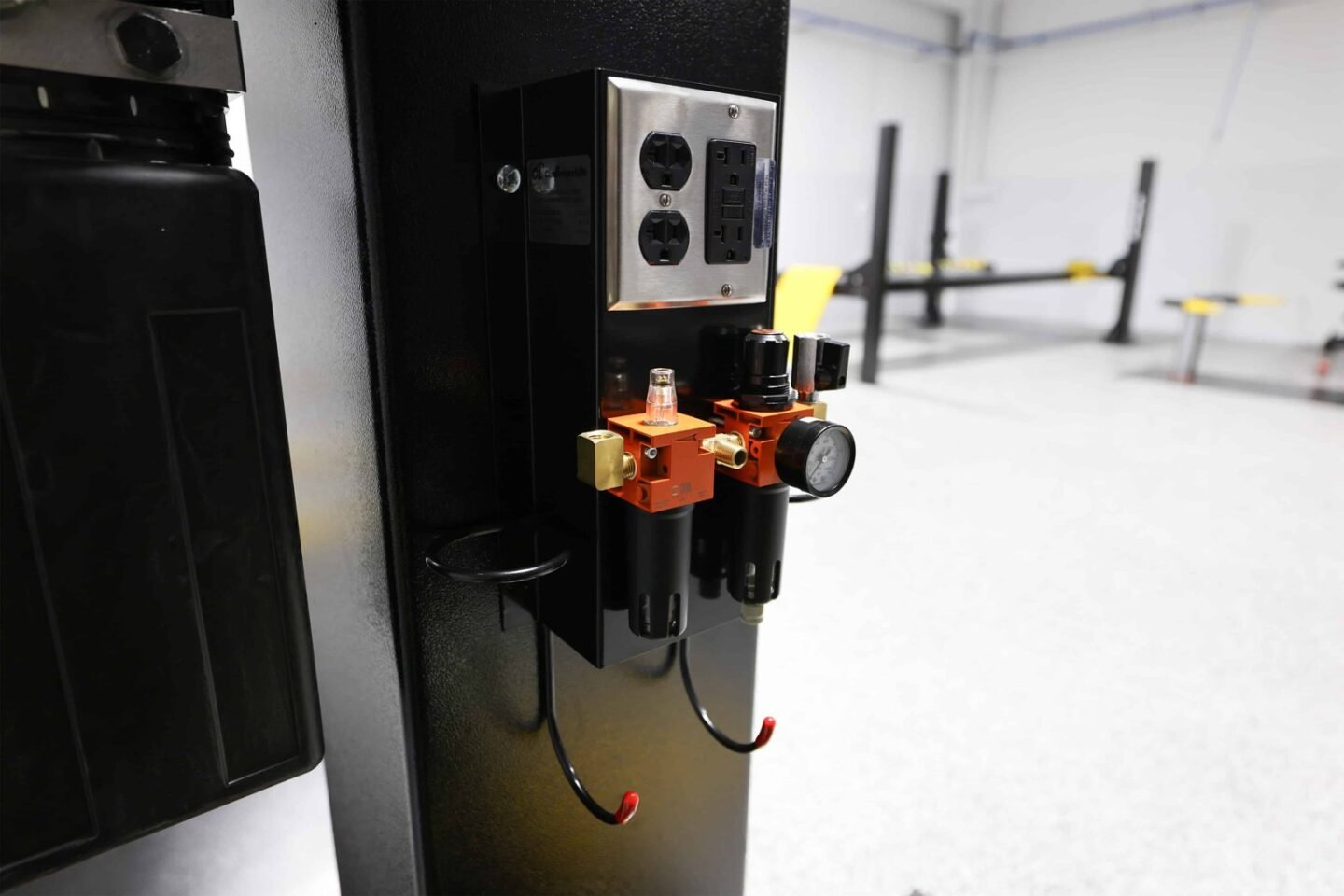automotive service department with vehicle lifts