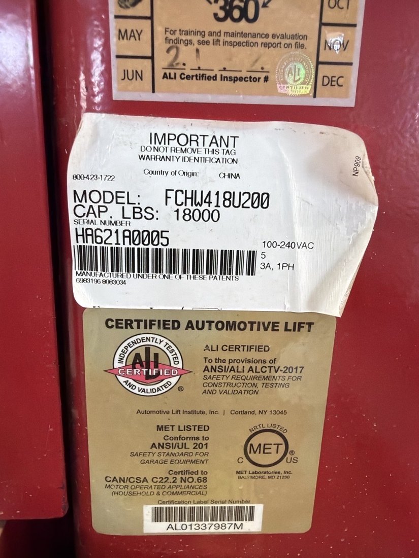 Forward 4-post lift model tag with model number and capacity
